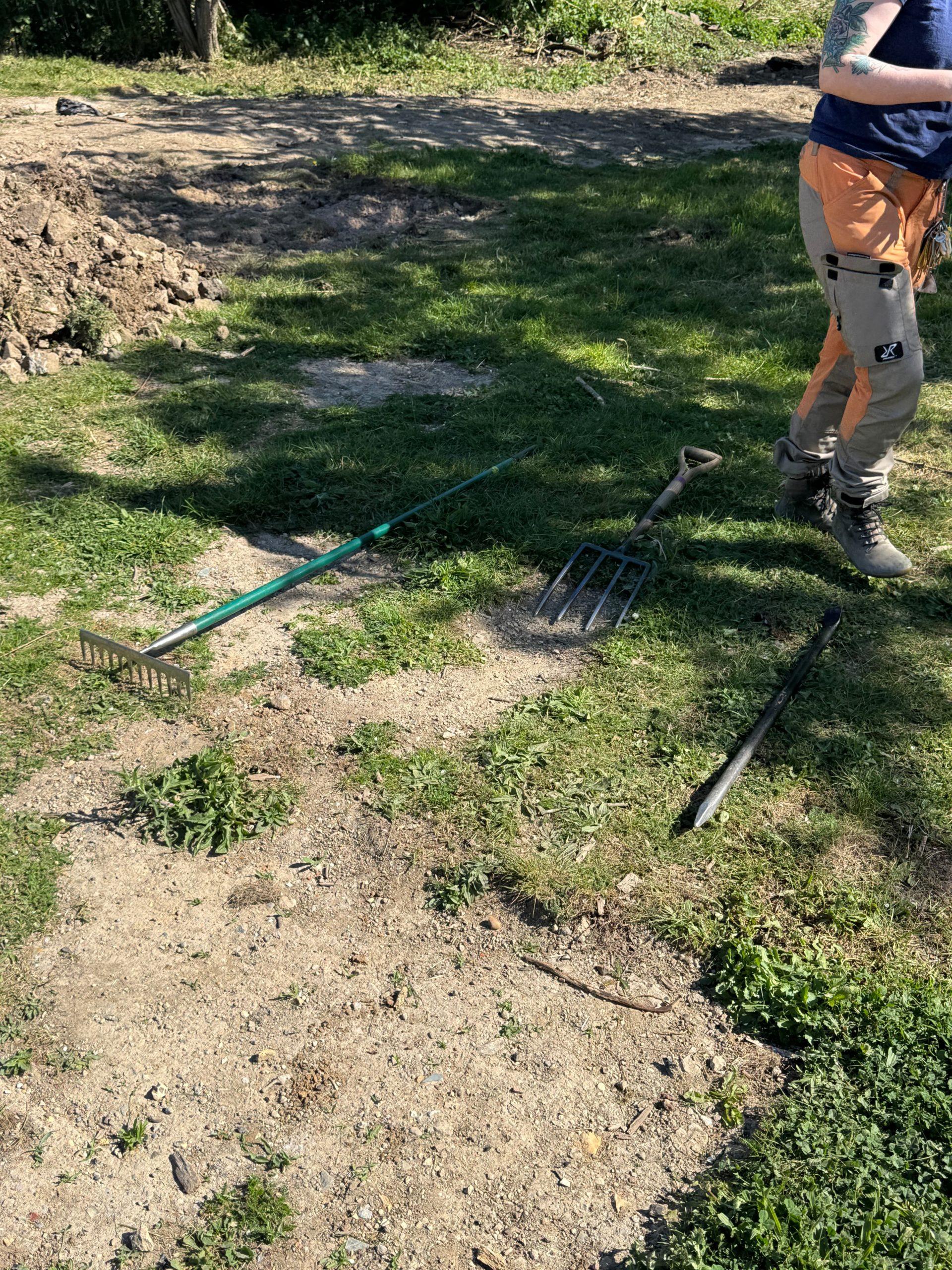 Our choice of 'weapons' for the day; rakes, pitchforks, etc